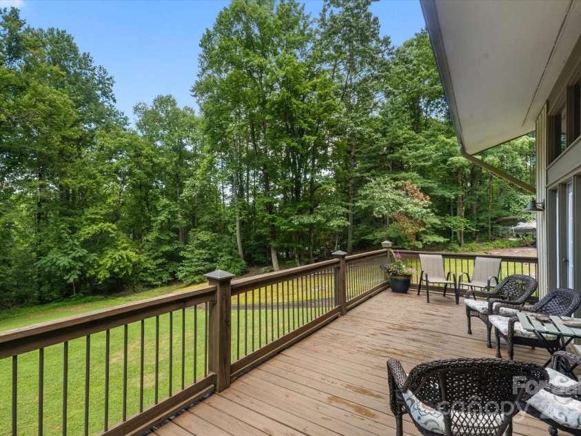 159 Big Poplar Lane, Zirconia, NC 28790.  MLS# CAR4280103, YatesRealty ID 26850. Enjoy your morning coffee on the large deck
