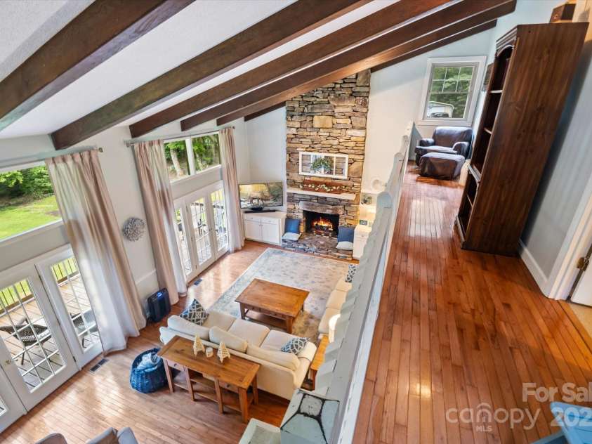 159 Big Poplar Lane, Zirconia, NC 28790.  MLS# CAR4280103, YatesRealty ID 26850. Loft area leading to 2 guest rooms