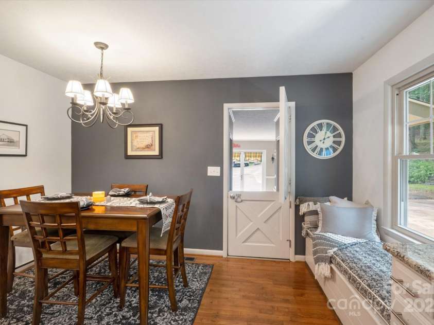 159 Big Poplar Lane, Zirconia, NC 28790.  MLS# CAR4280103, YatesRealty ID 26850. Reading nook looking out on back patio and nature