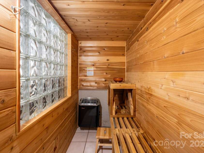 159 Big Poplar Lane, Zirconia, NC 28790.  MLS# CAR4280103, YatesRealty ID 26850. Sauna in lower level suite great addition for an AIRBNB