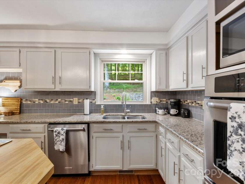 159 Big Poplar Lane, Zirconia, NC 28790.  MLS# CAR4280103, YatesRealty ID 26850. Stainless appliances and granite countertops