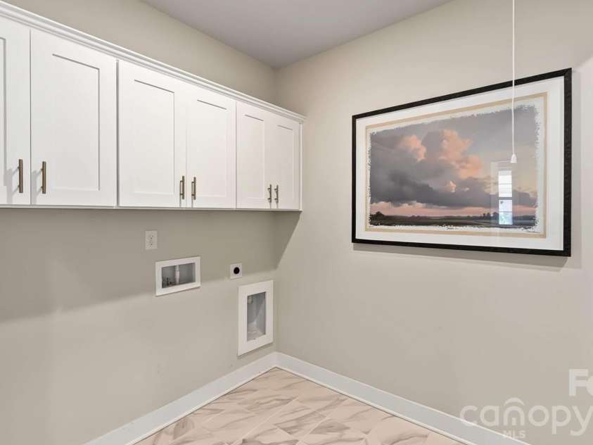 114 Jentri Way, Mooresville, NC 28115.  MLS# CAR4379864, YatesRealty ID 26851. Functional laundry
