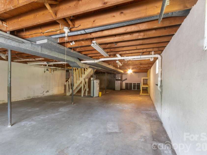 295 Bramlett Drive, Waynesville, NC 28785.  MLS# CAR4381280, YatesRealty ID 26852. This basement is perfect for storage or workshop 