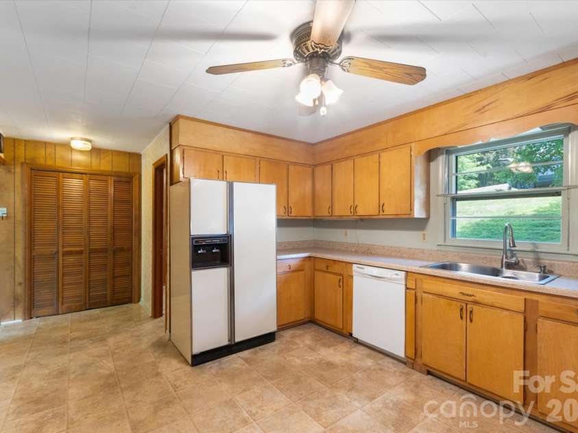 295 Bramlett Drive, Waynesville, NC 28785.  MLS# CAR4381280, YatesRealty ID 26852. Very spacious kitchen, with room for a kitchen table