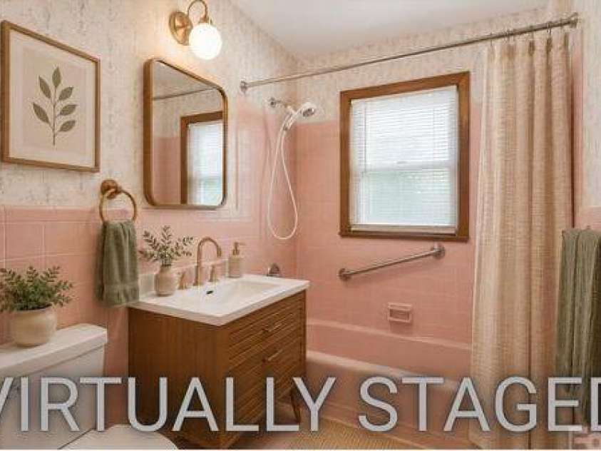 295 Bramlett Drive, Waynesville, NC 28785.  MLS# CAR4381280, YatesRealty ID 26852. Virtually staged guest bath