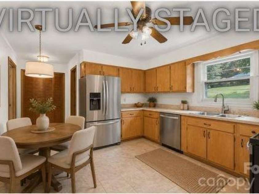 295 Bramlett Drive, Waynesville, NC 28785.  MLS# CAR4381280, YatesRealty ID 26852. Virtually staged kitchen with new appliances