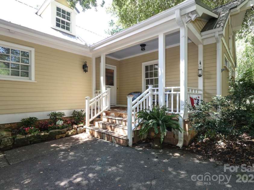 7794 Live Oaks Drive, Denver, NC 28037.  MLS# CAR4234292, YatesRealty ID 26852. Carriage/Guest house front porch