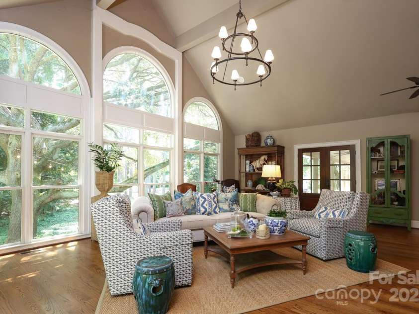 7794 Live Oaks Drive, Denver, NC 28037.  MLS# CAR4234292, YatesRealty ID 26852. Great room with palladien windows