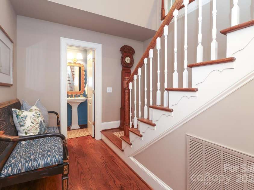 7794 Live Oaks Drive, Denver, NC 28037.  MLS# CAR4234292, YatesRealty ID 26852. Second staircase and main floor powder bath