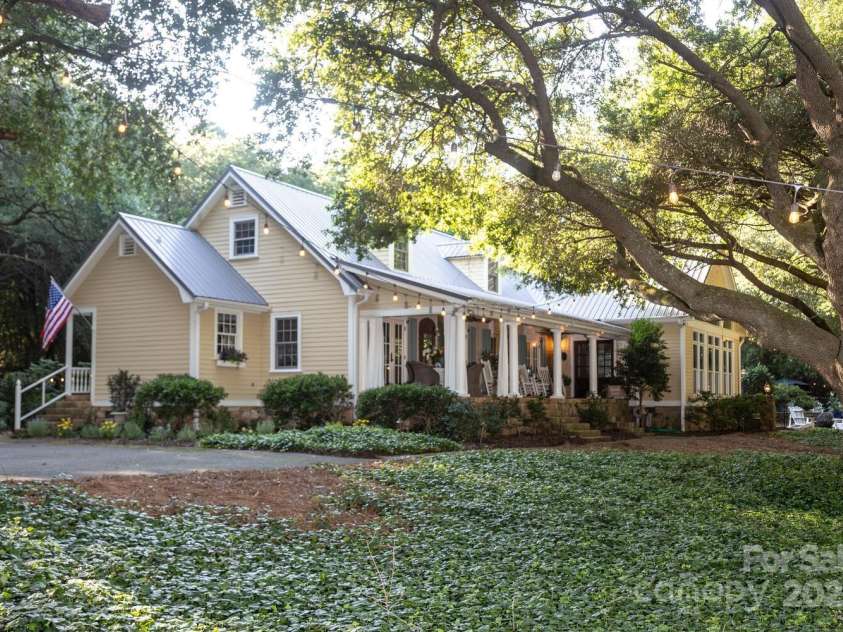 7794 Live Oaks Drive, Denver, NC 28037.  MLS# CAR4234292, YatesRealty ID 26852. Side elevation
