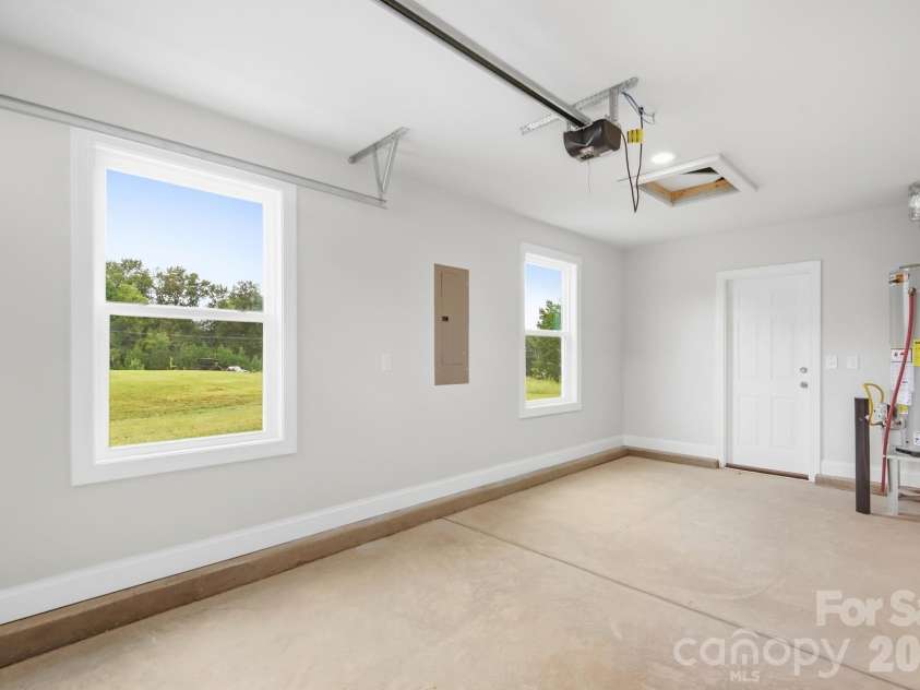 2517 Mabel Lane, Monroe, NC 28110.  MLS# CAR4327123, YatesRealty ID 26861. 1-car Front-entry Garage