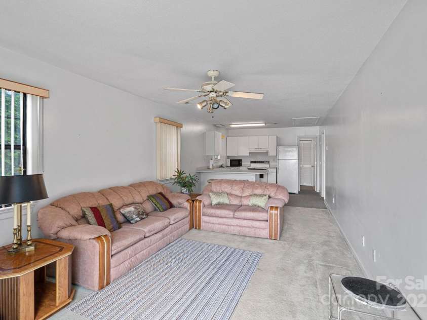 403 Nivens Cove Road, Mount Holly, NC 28120.  MLS# CAR4282822, YatesRealty ID 26868. Guest apartment above garage