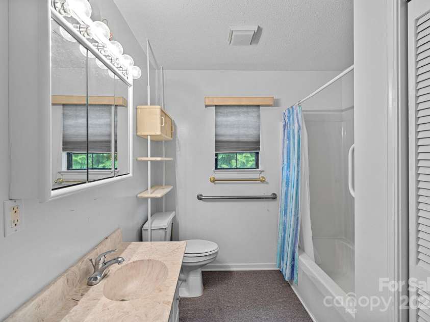 403 Nivens Cove Road, Mount Holly, NC 28120.  MLS# CAR4282822, YatesRealty ID 26868. Guest apartment above garage