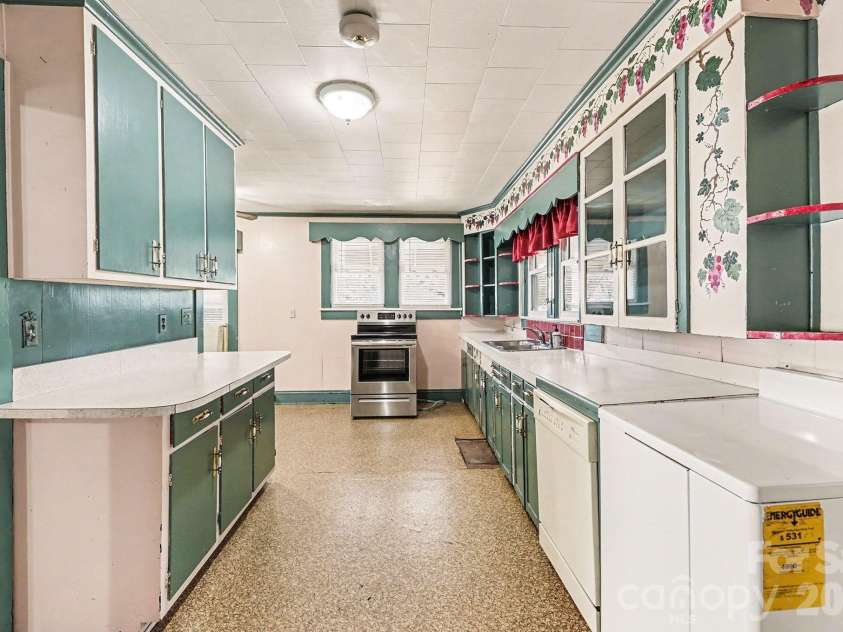 301 Gold Hill Drive, Salisbury, NC 28146.  MLS# CAR4337770, YatesRealty ID 2687. The appliance in the lower right corner is your water heater, and a glasstop Frigidaire range in the middle of the picture.