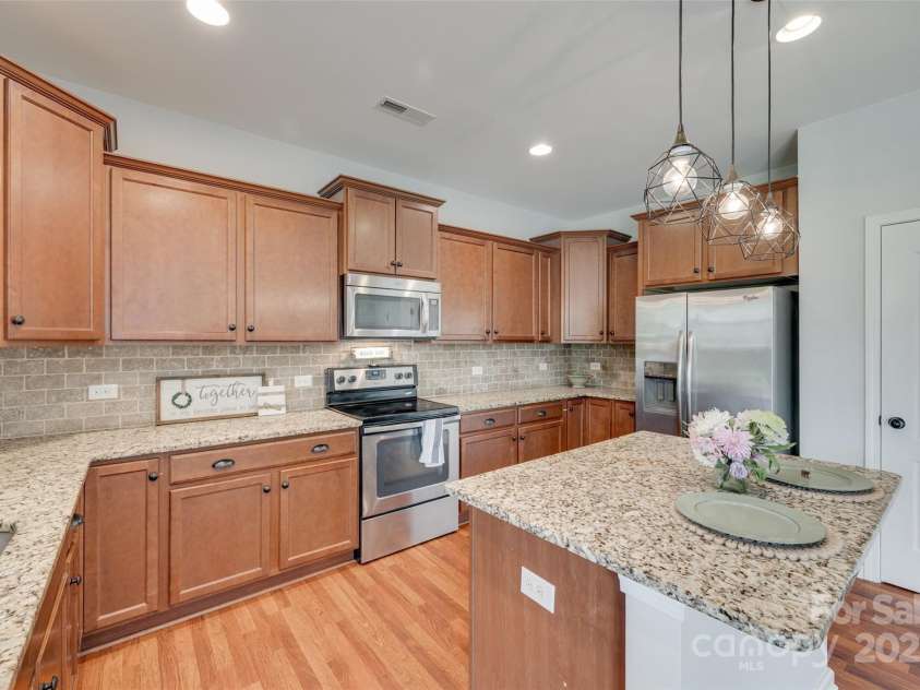 1412 Afternoon Sun Road, Matthews, NC 28104.  MLS# CAR4259106, YatesRealty ID 26877. 