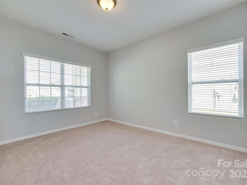 1412 Afternoon Sun Road, Matthews, NC 28104.  MLS# CAR4259106, YatesRealty ID 26877. Down Stairs Bedroom