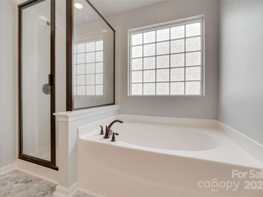 1412 Afternoon Sun Road, Matthews, NC 28104.  MLS# CAR4259106, YatesRealty ID 26877. Primary Bath