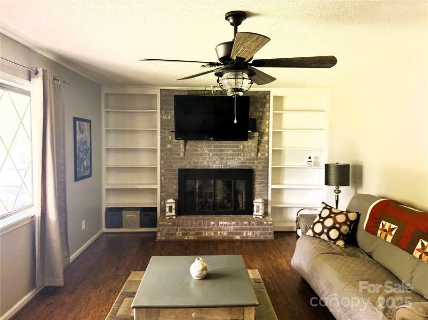 136 Christopher Road, Marion, NC 28752.  MLS# CAR4267352, YatesRealty ID 26878. Living room/fireplace