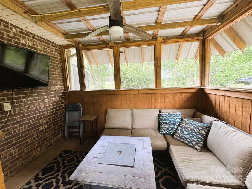 136 Christopher Road, Marion, NC 28752.  MLS# CAR4267352, YatesRealty ID 26878. Screened in patio area