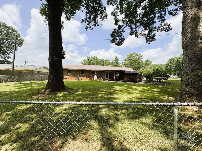 136 Christopher Road, Marion, NC 28752.  MLS# CAR4267352, YatesRealty ID 26878. View from back of fenced in yard