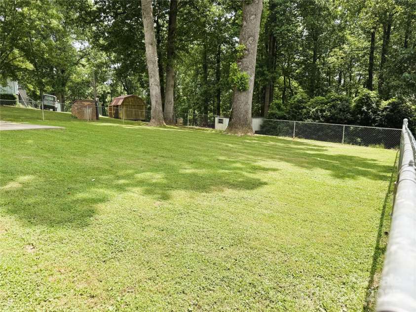 136 Christopher Road, Marion, NC 28752.  MLS# CAR4267352, YatesRealty ID 26878. View of fenced in back yard