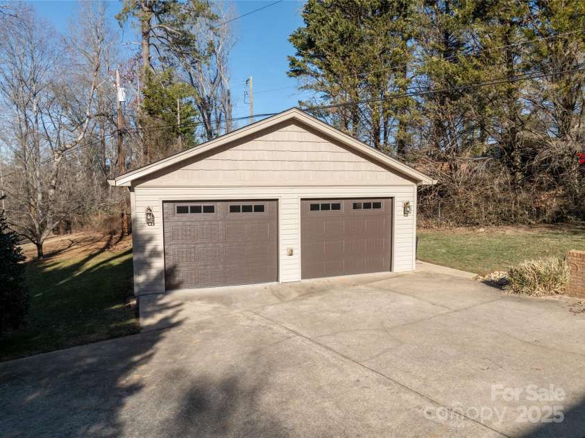 113 Pait Drive, Hendersonville, NC 28791.  MLS# CAR4218353, YatesRealty ID 2688. 2 car garage. Smart technology doors.