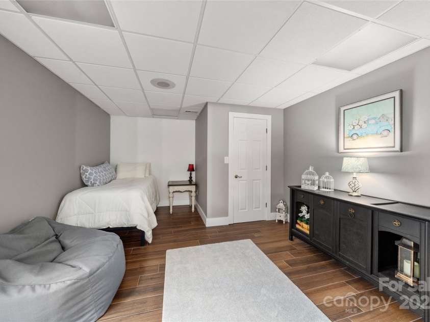 113 Pait Drive, Hendersonville, NC 28791.  MLS# CAR4218353, YatesRealty ID 2688. Bonus room off full bath on lower level