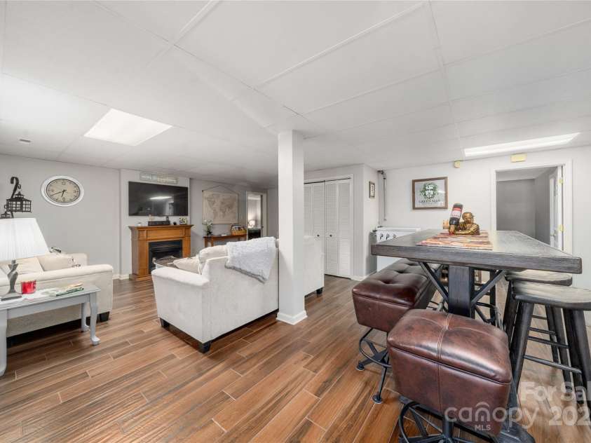 113 Pait Drive, Hendersonville, NC 28791.  MLS# CAR4218353, YatesRealty ID 2688. Fully finished lower level with 3 beds/bonus rooms