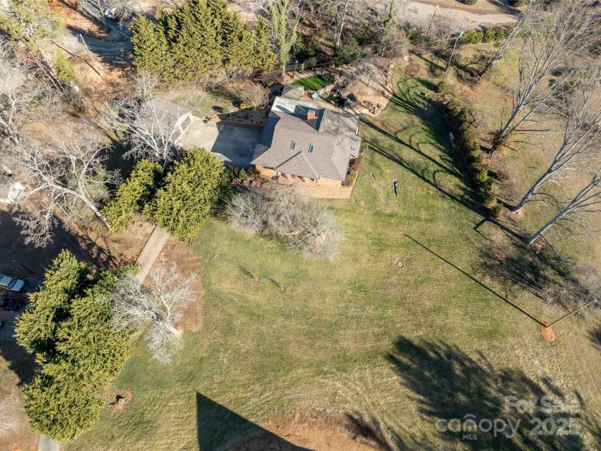 113 Pait Drive, Hendersonville, NC 28791.  MLS# CAR4218353, YatesRealty ID 2688. Private level acre with long range views