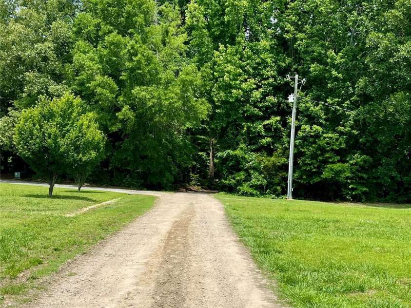 719 Phillipstown Road, Kershaw, SC 29067.  MLS# CAR4365888, YatesRealty ID 26880. Driveway from Main Rd