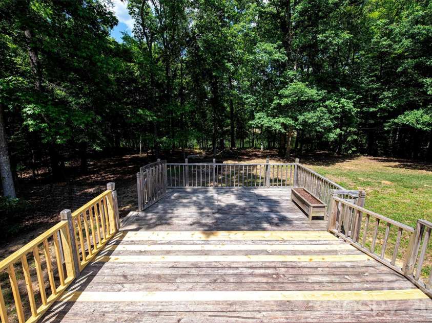 719 Phillipstown Road, Kershaw, SC 29067.  MLS# CAR4365888, YatesRealty ID 26880. Rear Deck Overlooking the Pond