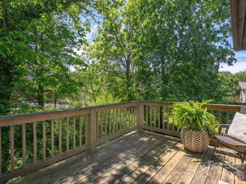 15 Hillside Street, Asheville, NC 28801.  MLS# CAR4350045, YatesRealty ID 26883. Relax among the trees