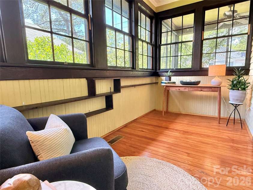 15 Hillside Street, Asheville, NC 28801.  MLS# CAR4350045, YatesRealty ID 26883. Sunroom off parlor