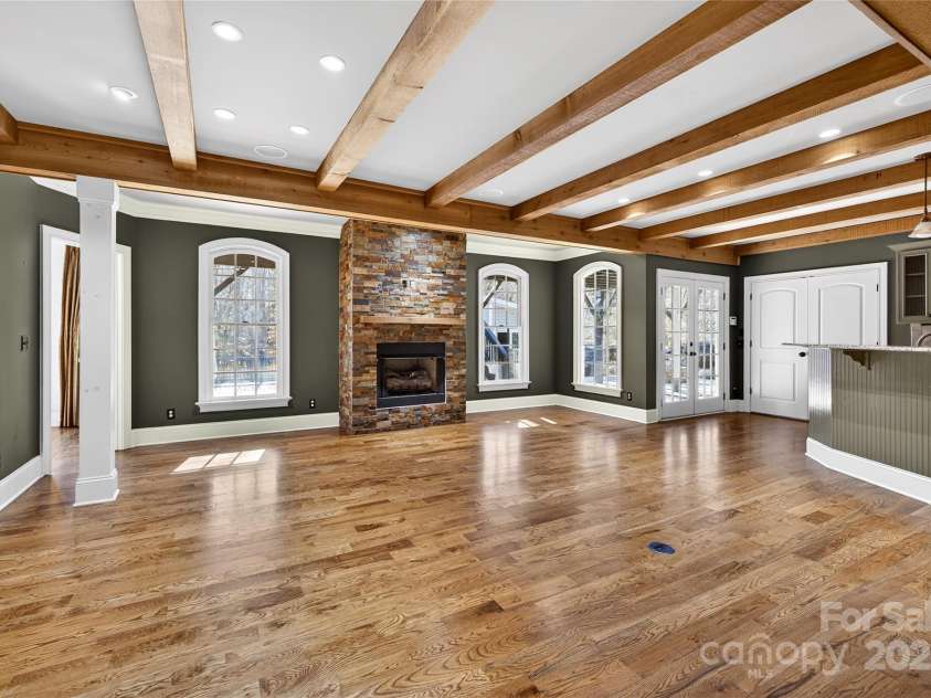 6800 Augustine Way, Charlotte, NC 28270.  MLS# CAR4331637, YatesRealty ID 26883. Basement living room 