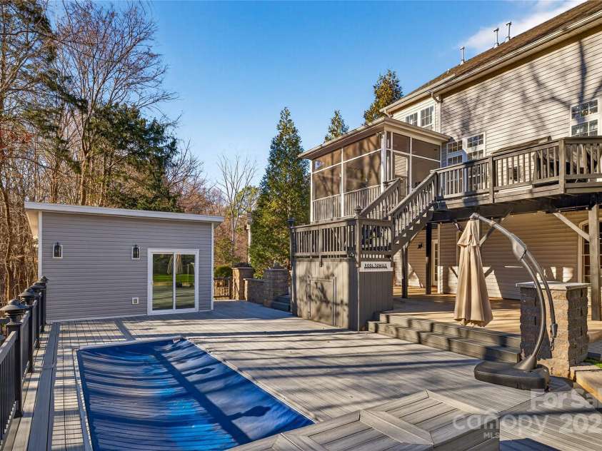 6800 Augustine Way, Charlotte, NC 28270.  MLS# CAR4331637, YatesRealty ID 26883. Oversized hot tub/plunge pool & Pool house 