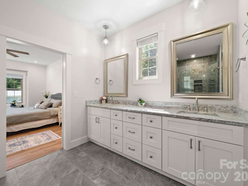 445 Governors View Road, Asheville, NC 28805.  MLS# CAR4383866, YatesRealty ID 26886. Large double Vanity