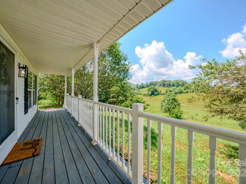 19 New Liberty Road, Leicester, NC 28748.  MLS# CAR4278479, YatesRealty ID 26888. Front covered porch