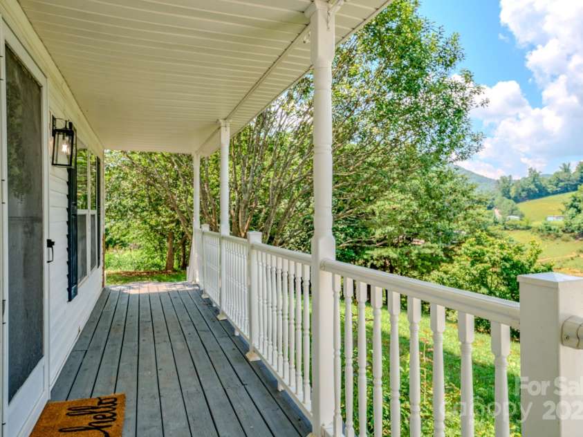 19 New Liberty Road, Leicester, NC 28748.  MLS# CAR4278479, YatesRealty ID 26888. Front covered porch