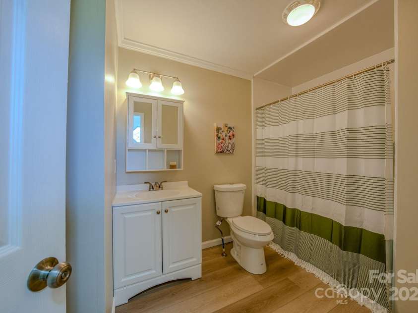 19 New Liberty Road, Leicester, NC 28748.  MLS# CAR4278479, YatesRealty ID 26888. Guest Bathroom