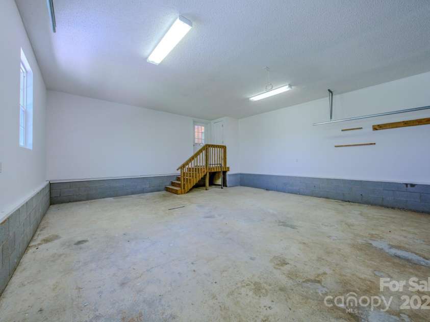 19 New Liberty Road, Leicester, NC 28748.  MLS# CAR4278479, YatesRealty ID 26888. Large 2 car garage