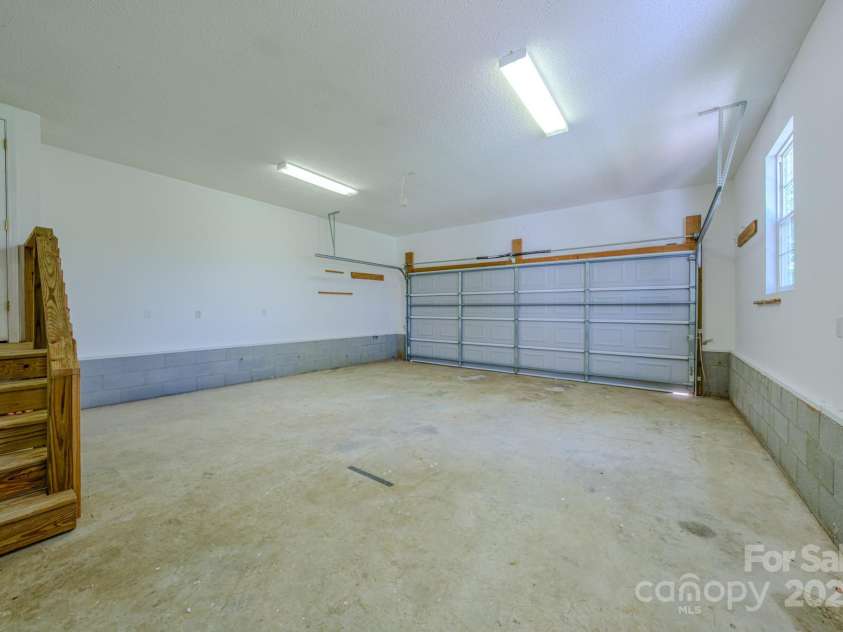 19 New Liberty Road, Leicester, NC 28748.  MLS# CAR4278479, YatesRealty ID 26888. Large 2 car garage