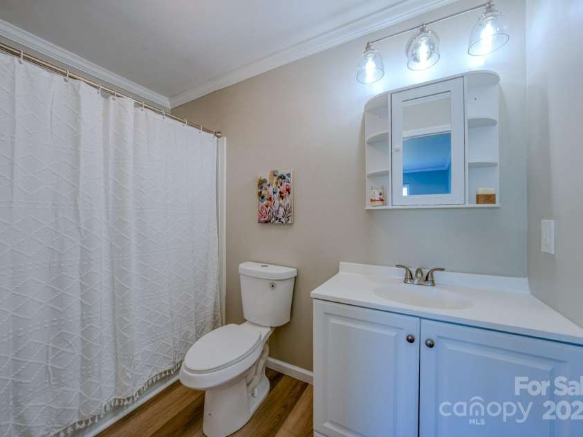 19 New Liberty Road, Leicester, NC 28748.  MLS# CAR4278479, YatesRealty ID 26888. Primary ensuite bathroom
