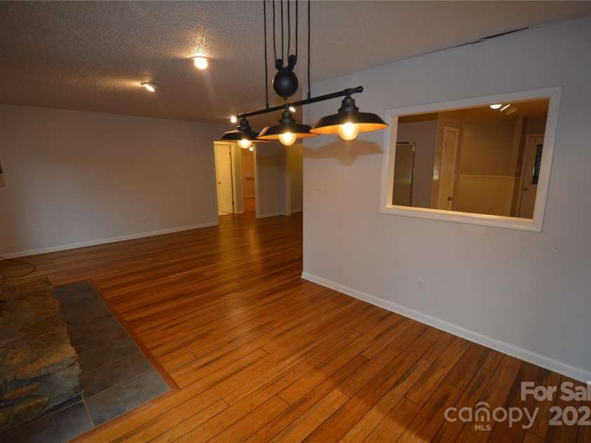 3 Jean Drive, Asheville, NC 28803.  MLS# CAR4229298, YatesRealty ID 2689. Living from Dining area
