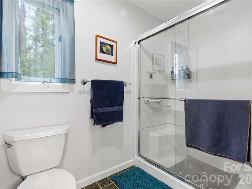 16 Woodsong Lane, Brevard, NC 28712.  MLS# CAR4378122, YatesRealty ID 26891. 
