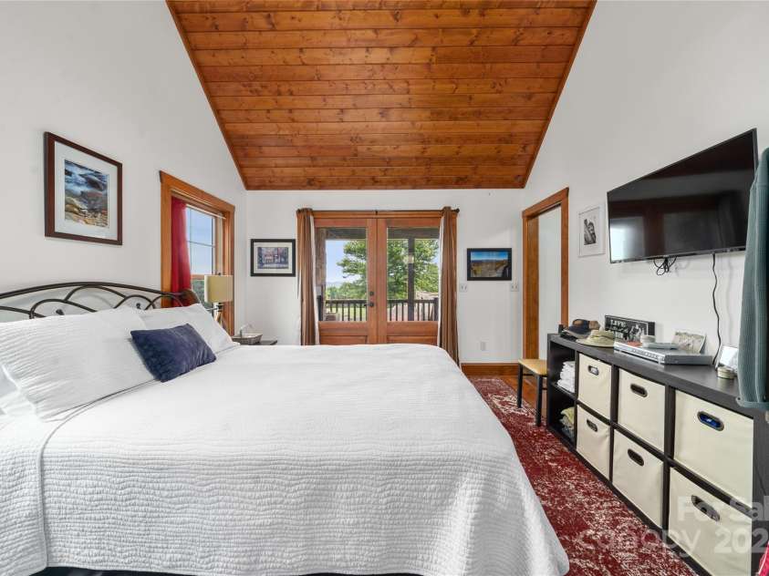 4862 Pinnacle Mountain Road, Zirconia, NC 28790.  MLS# CAR4262983, YatesRealty ID 26893. Guest Cabin Bedroom