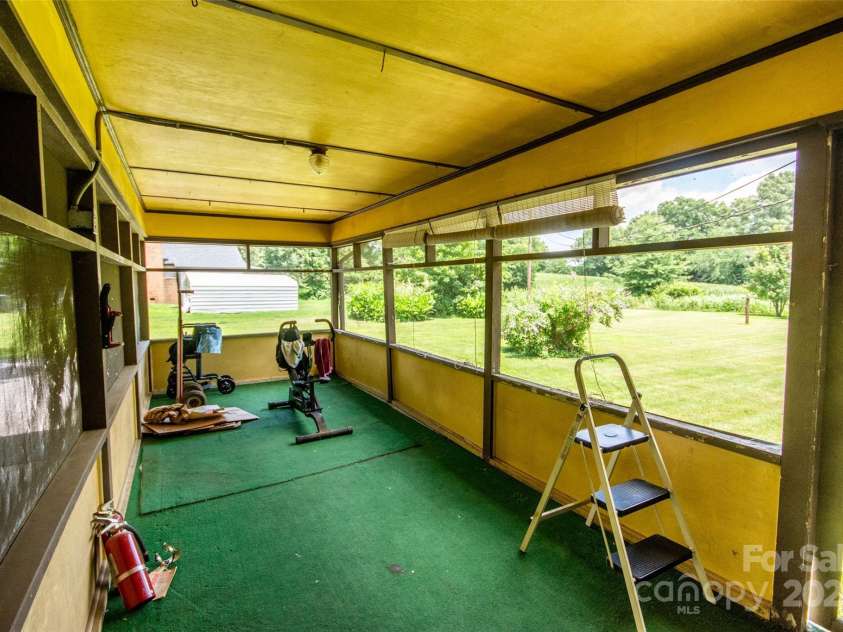 615 Bell Farm Road, Statesville, NC 28625.  MLS# CAR4272410, YatesRealty ID 26898. Screened porch