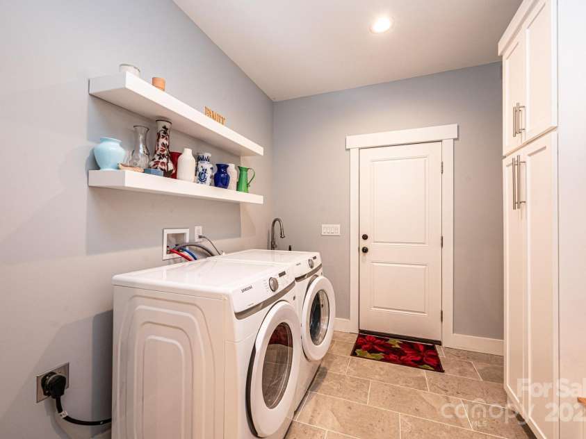 100 White Fawn Circle, Granite Falls, NC 28630.  MLS# CAR4200068, YatesRealty ID 269. Mud Room includes a bench, sink and closets