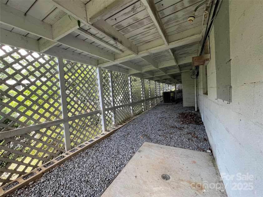 130 Sherwood Drive, Lake Lure, NC 28746.  MLS# CAR4279406, YatesRealty ID 26905. Area under deck