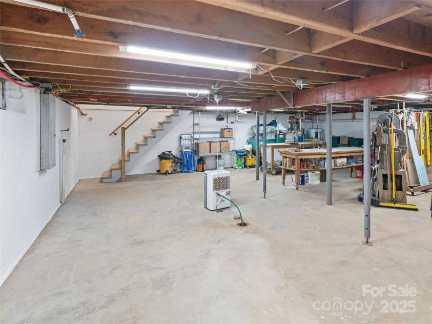 3829 Coxes Creek Road, Burnsville, NC 28714.  MLS# CAR4246043, YatesRealty ID 26911. Full Basement formally used as a Woodworking and Pottery Studio