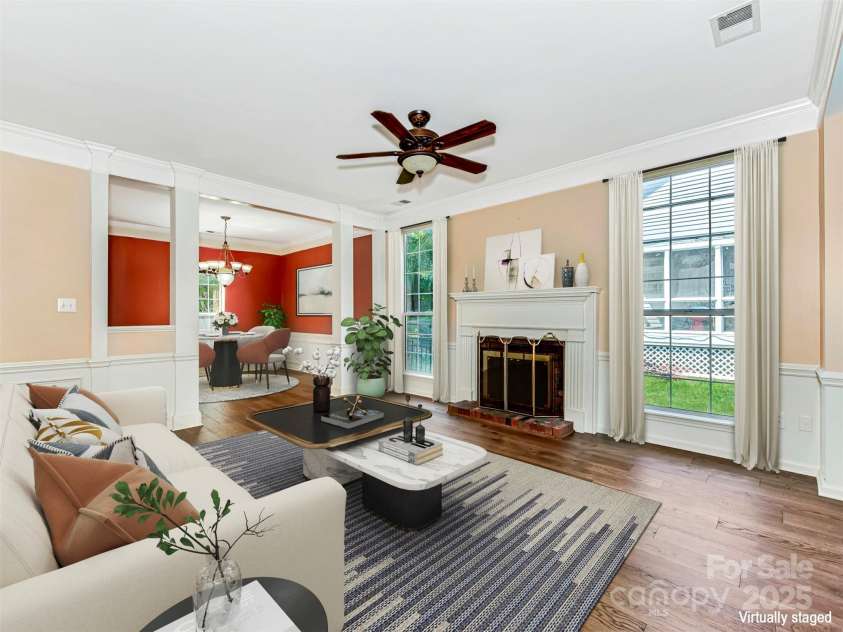 2825 Redfield Drive, Charlotte, NC 28270.  MLS# CAR4253533, YatesRealty ID 26913. Living room (virtually staged)